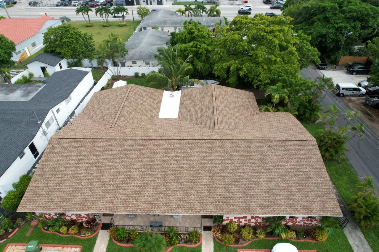 New GAF Timberline Shingle Roof and GAF 60 mil Evergaurd TPO Flat Roof in Hallandale Beach, Fl